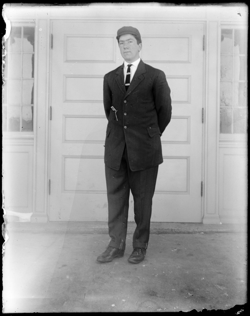 Miniature of Young Man In A Suit And Cap