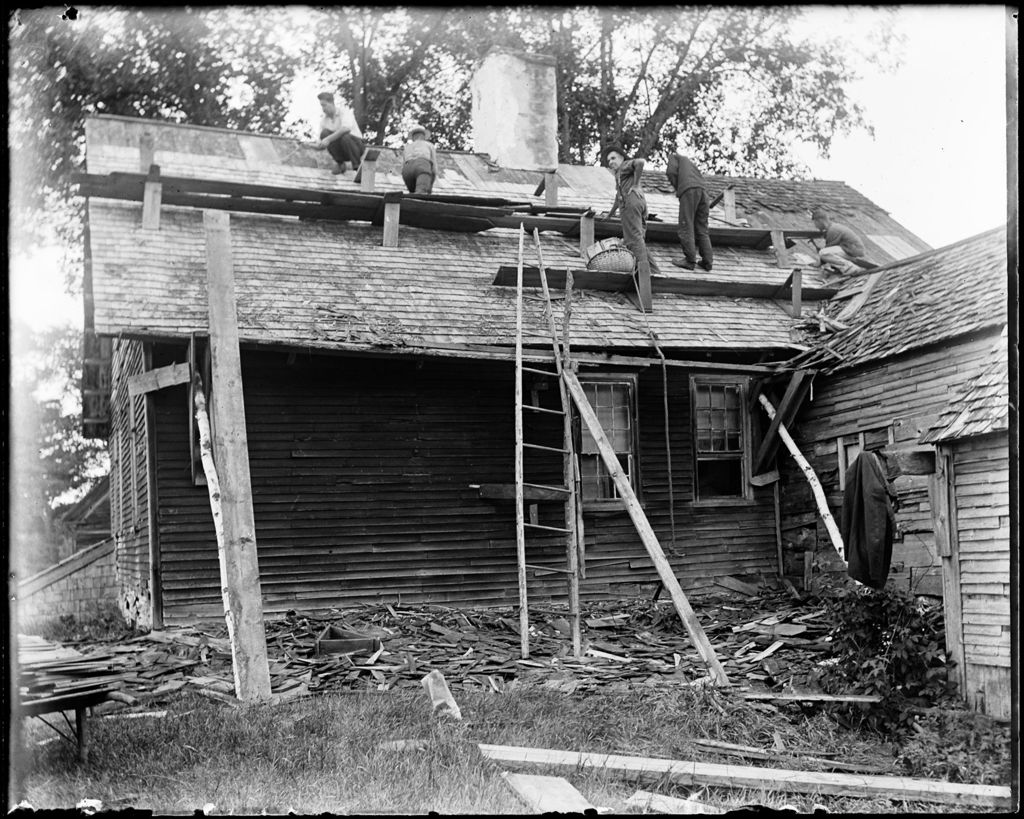 Miniature of Group Of Men Shingling The Roof Of An Old, Rural House