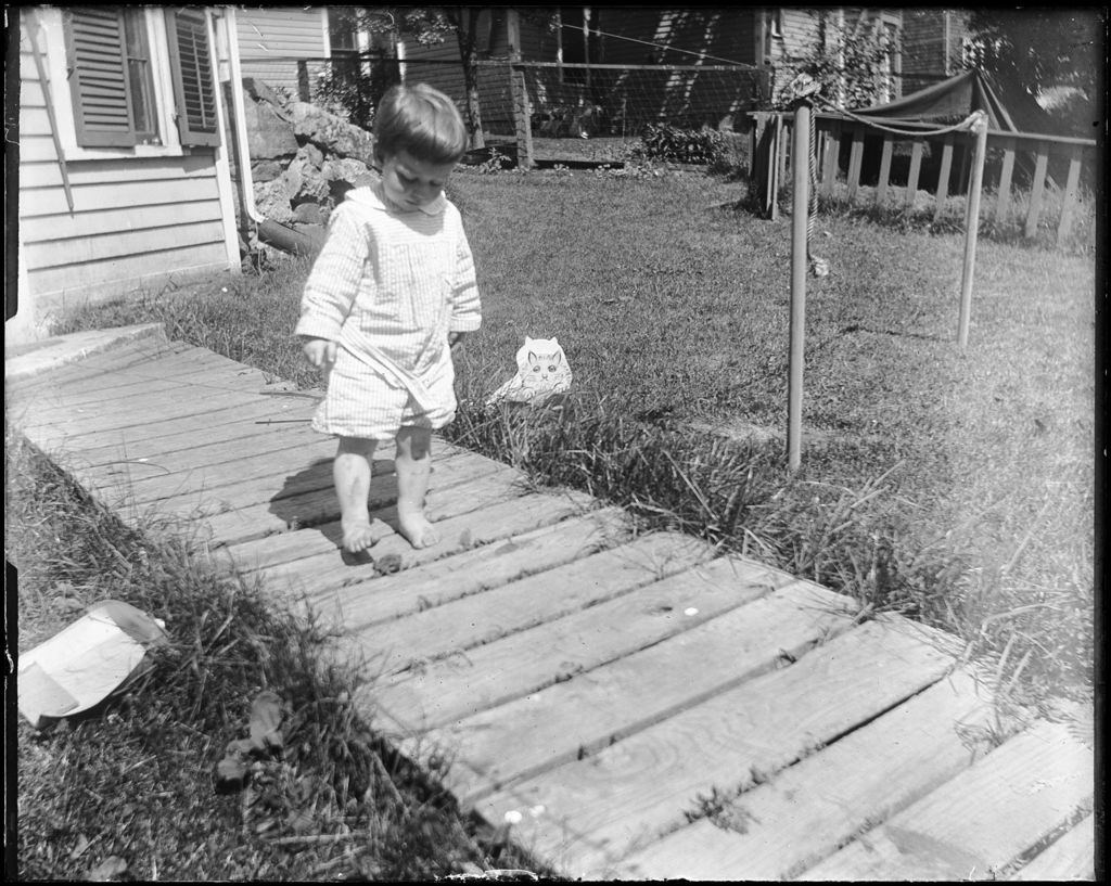Miniature of Young Boy Playing With A Toad