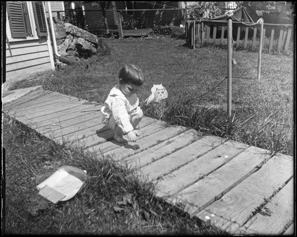 Miniature of Young Boy Playing With A Toad