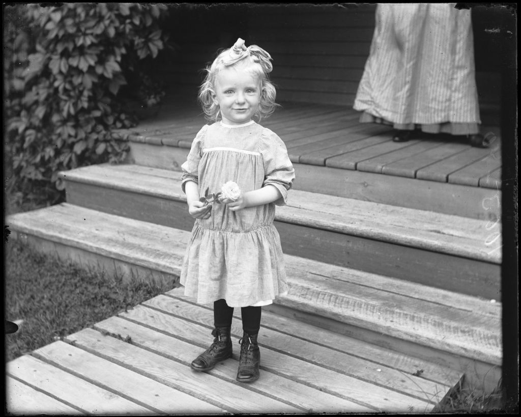 Miniature of Little Girl Holding A Rose
