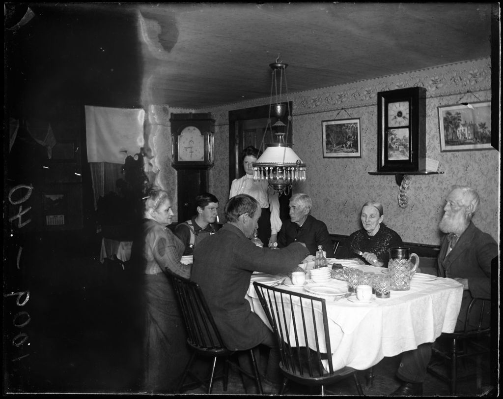 Miniature of Family Gathered For Supper