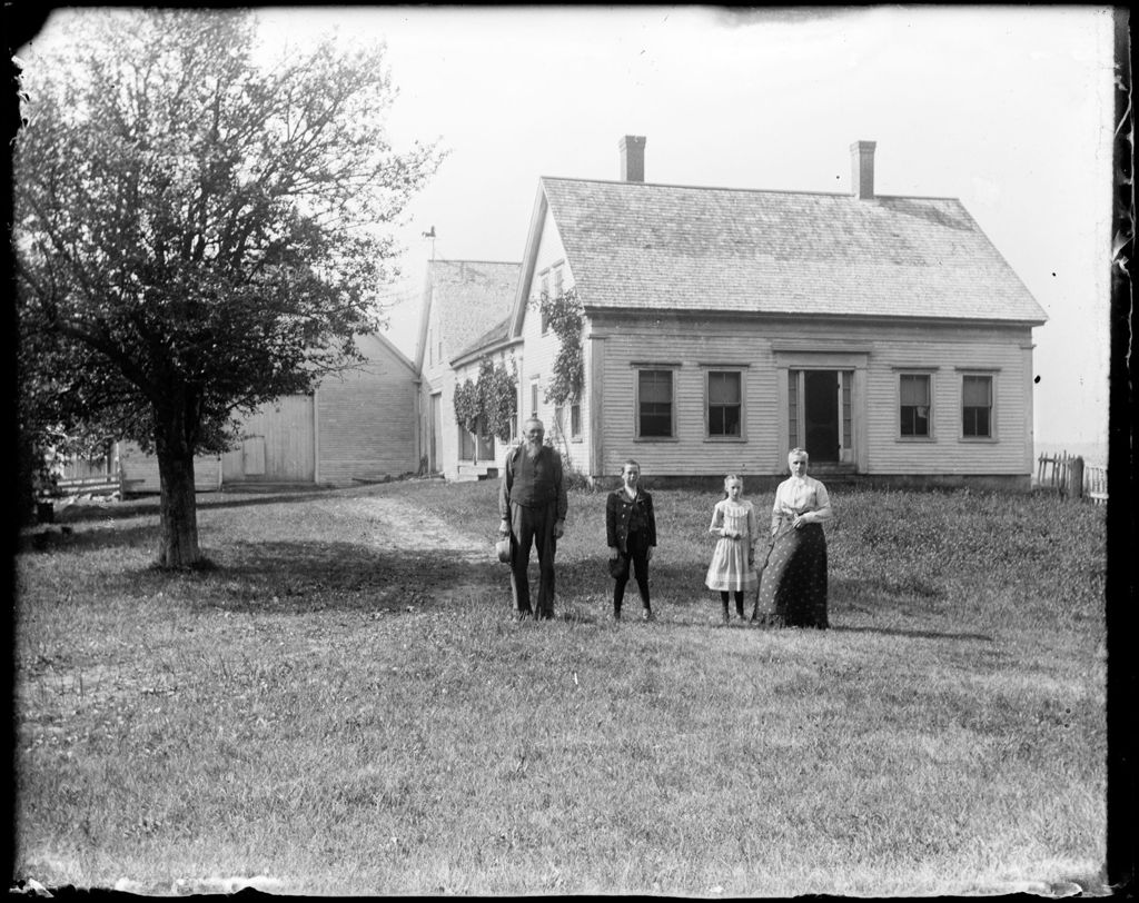 Miniature of Family Posed Standing Outside Their Rural Farm House