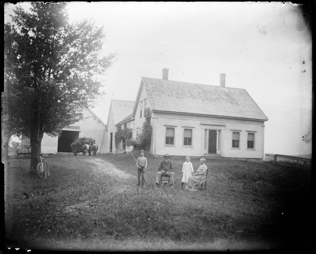Miniature of Family Posed Standing Outside Their Rural Farm House