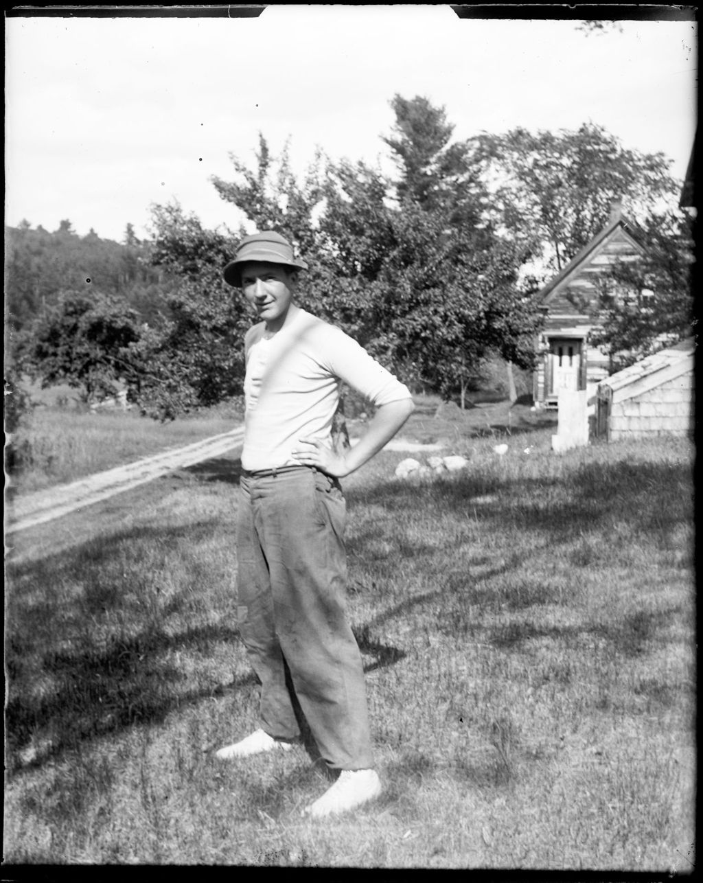 Miniature of Young Man (Ernie) Standing In The Yard Of A House