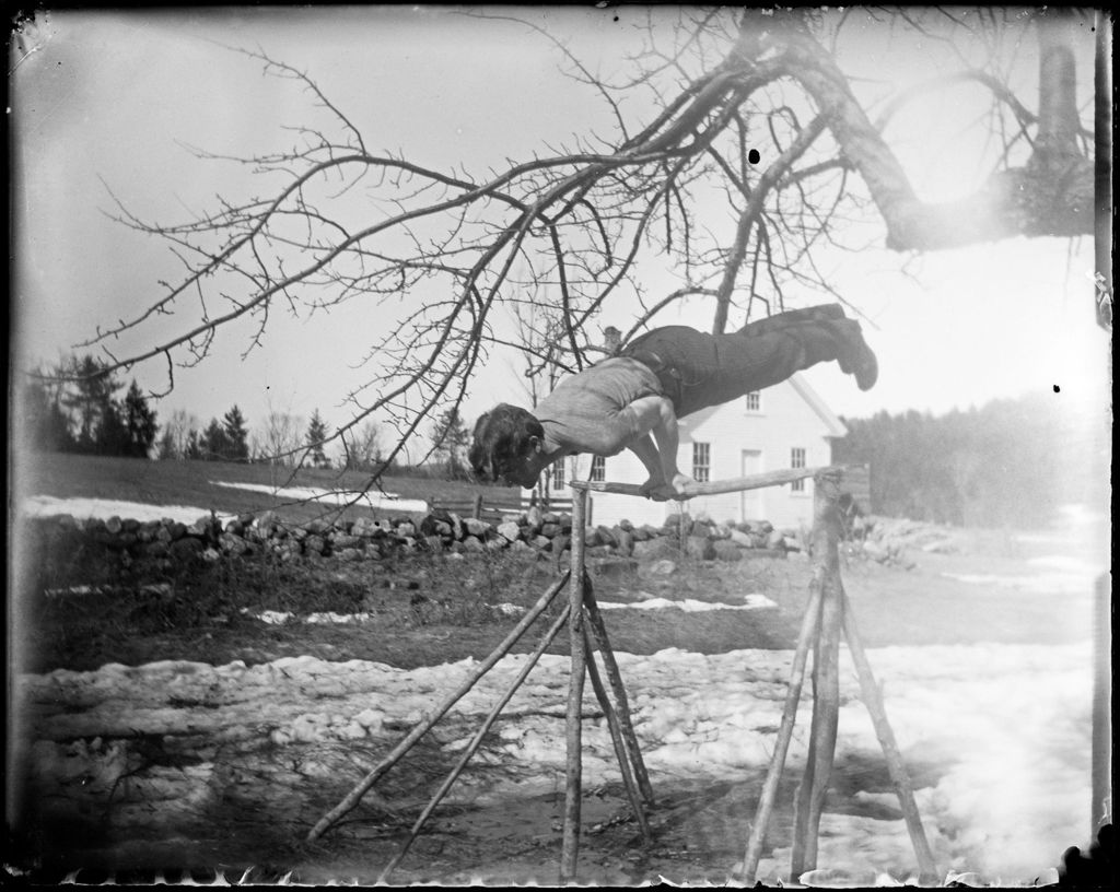 Miniature of George French Doing Gymnastics On A Homemade Bar