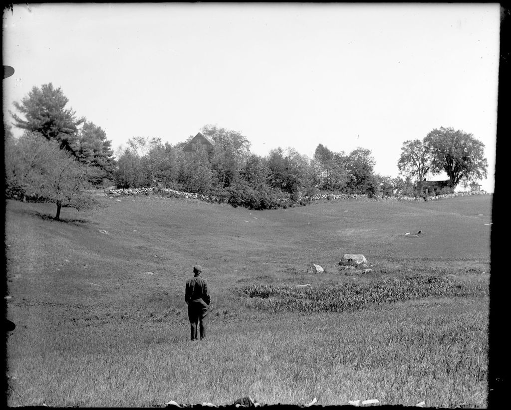 Miniature of Man Standing In A Field, View Of House & Stone Wall