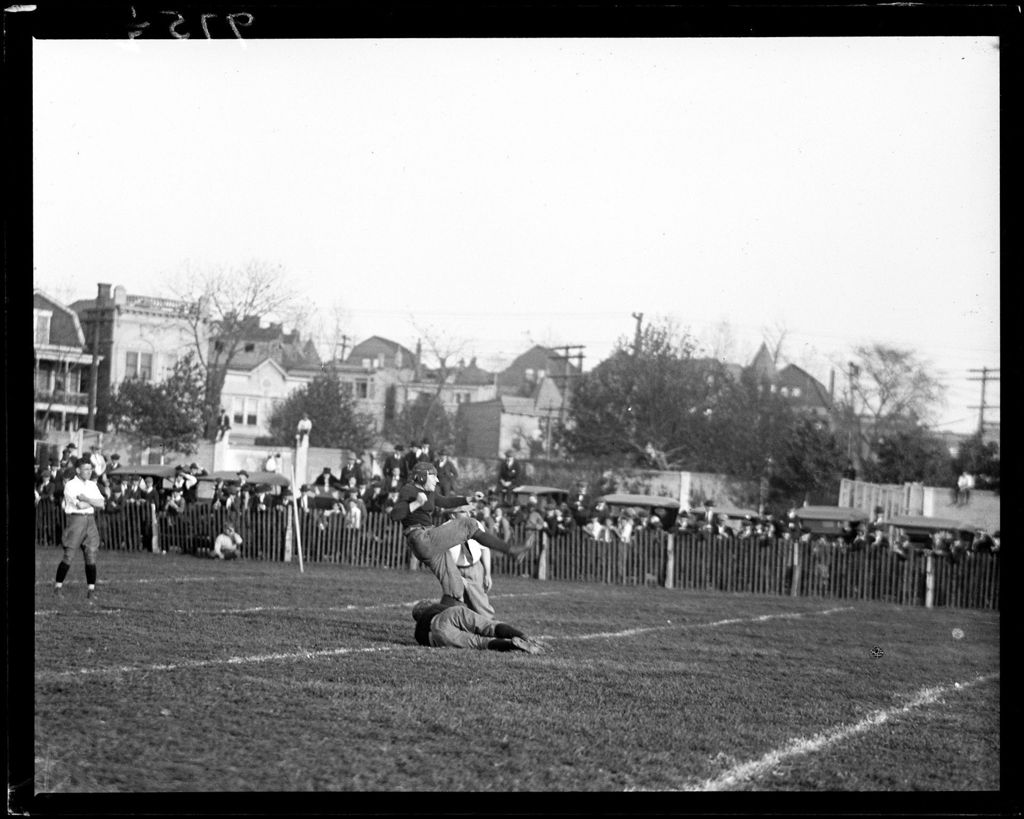Miniature of Football Player Kicking A Field Goal