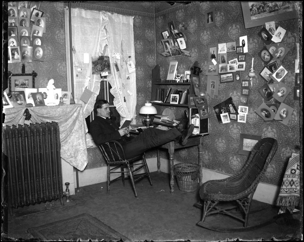 Miniature of (College) Student Sitting And Reading In His Room Bates