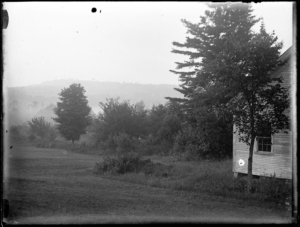 Miniature of View Past A House Of Fields And Hills