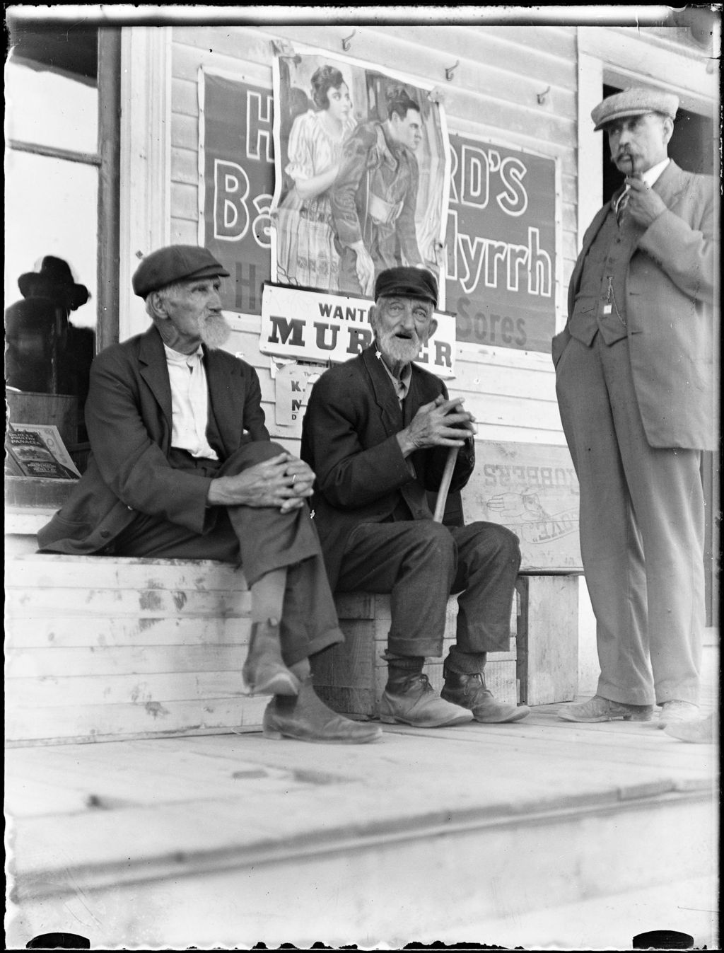 Miniature of Three Men On The Porch Of A Country Store