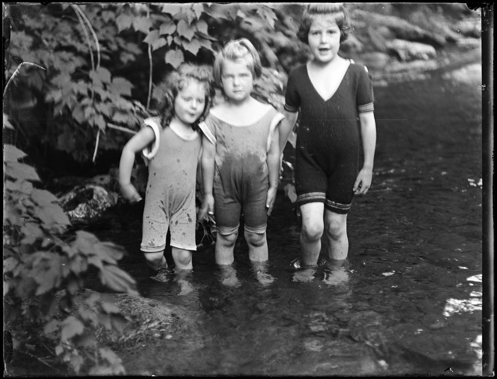 Miniature of Three Young Girls Standing Knee Deep In A Stream