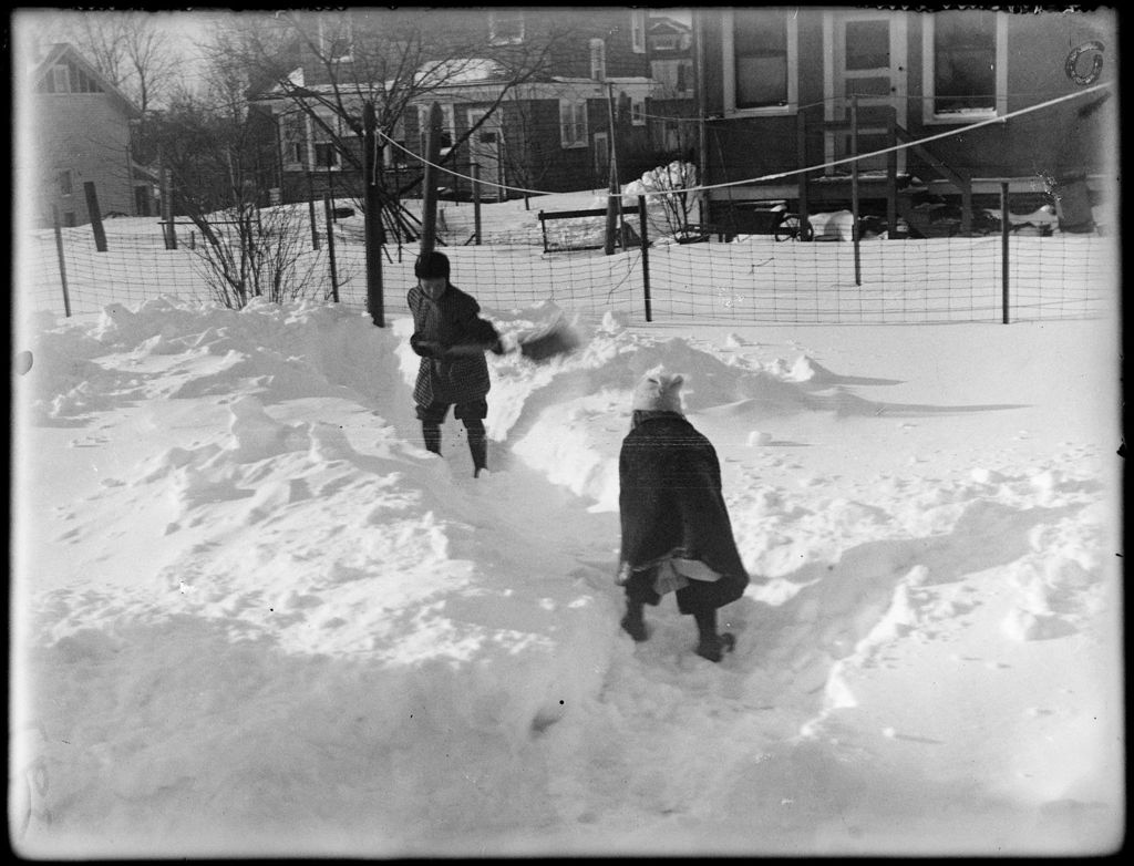 Miniature of Two Young Children Playing In The Snow