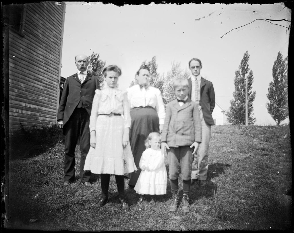 Miniature of Family Group Outside Their Home