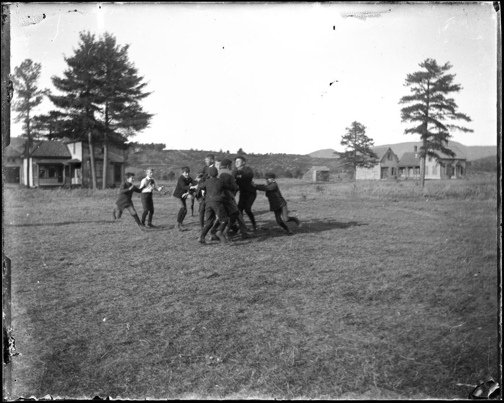 Miniature of Boys Playing Football In A Rural Field