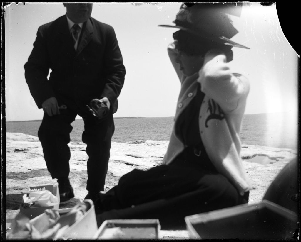 Miniature of Couple Having A Picnic On A Rocky Shore