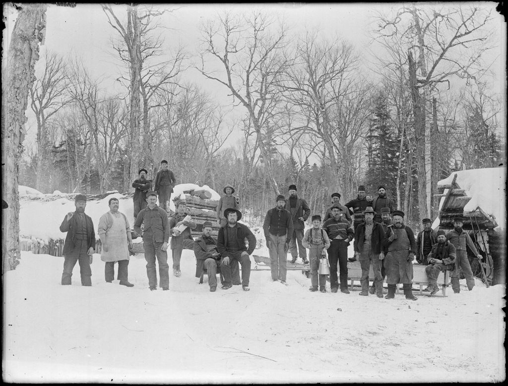 Miniature of Snow covered winter scene of men at a logging camp