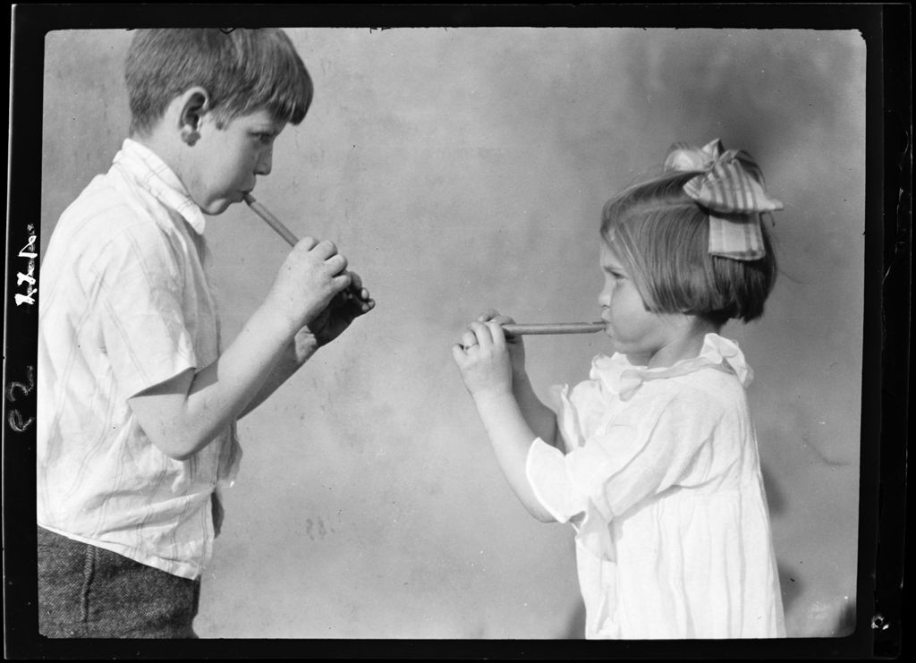 Miniature of Tots- Close-up Of Don And Barbara Blowing Whistle's Togeather