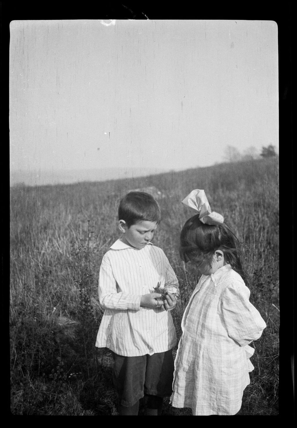 Miniature of Tots- Don And Barb Stand He Holds "Poor Bird" Found Dead