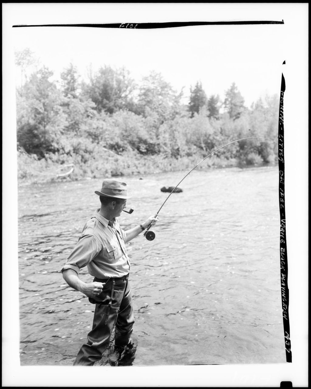 Miniature of Man With What Appears To Be A Nice Catch Of Fish