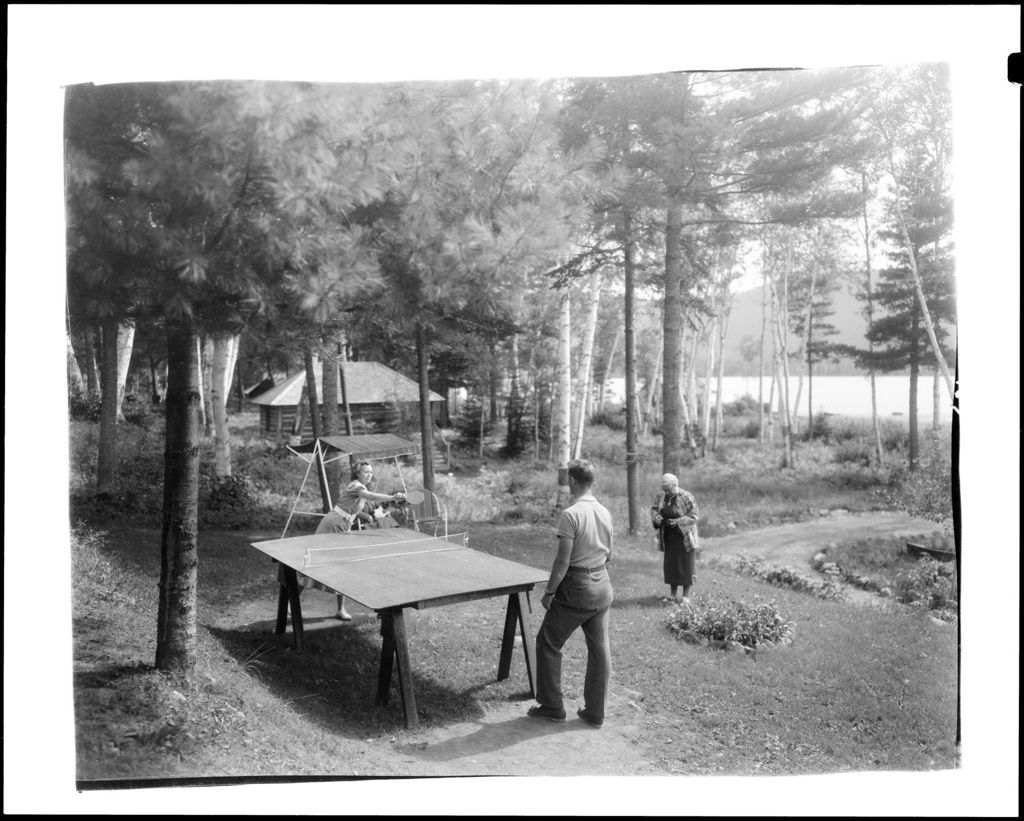 Miniature of Young Couple Playing Ping Pong Outdoors Near A Camp
