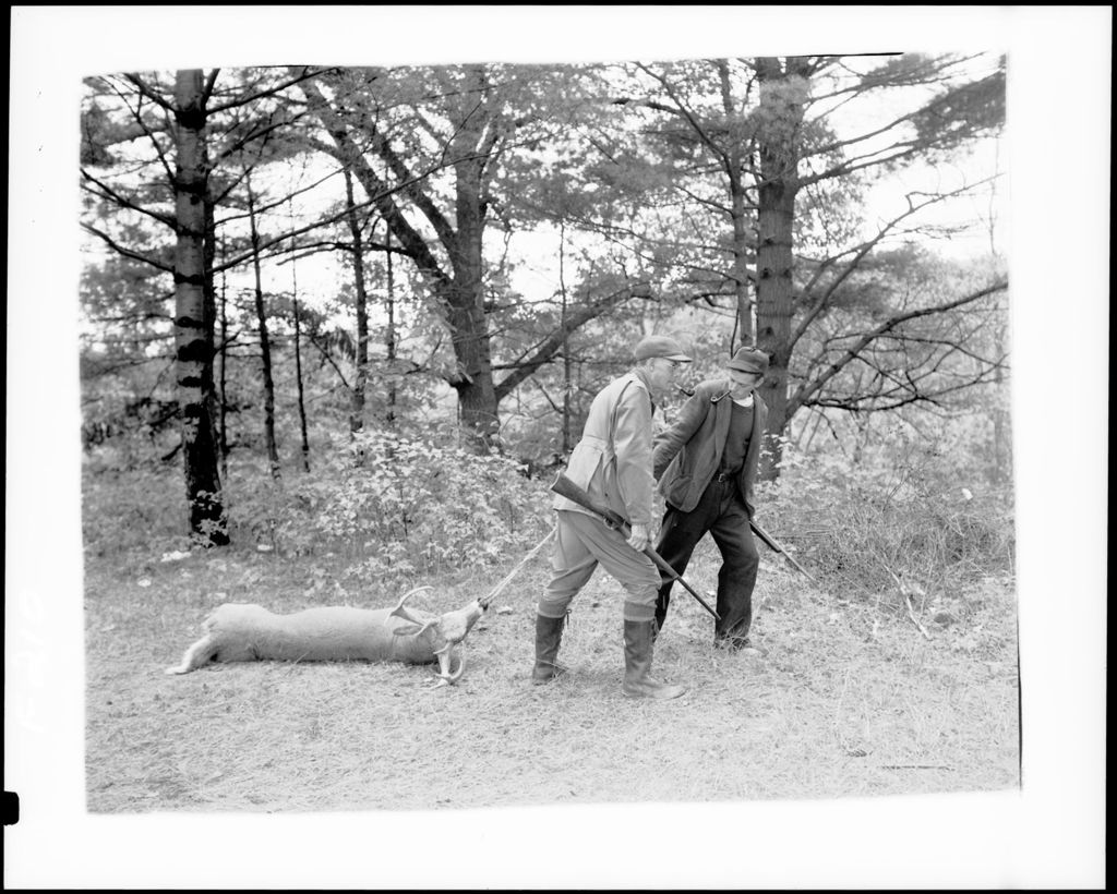 Miniature of Deer Hunters Dragging Out A Ten Point Buck