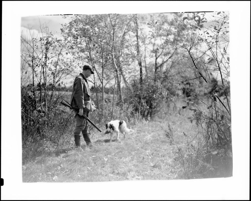 Miniature of Hunter Waiting For Dog To Retrieve Downed Bird