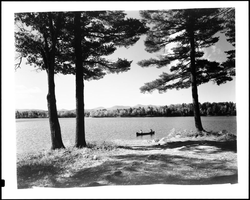 Miniature of Canoeists On Lake Kezar, Nicely Framed By Trees, Mountains In Distance