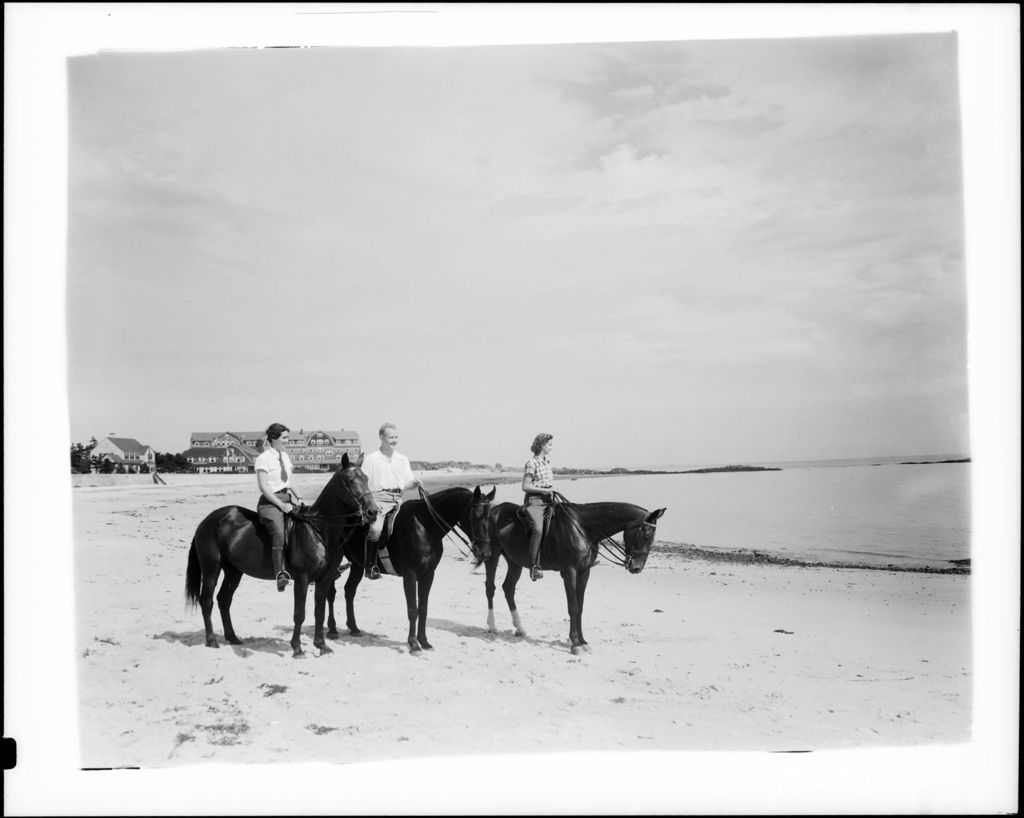 Miniature of Three Riders On A Beach, Large Hotel In Background