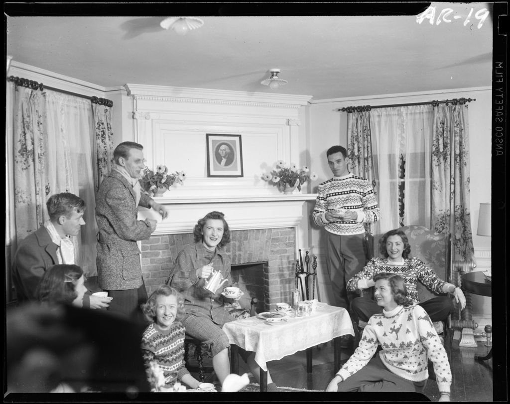 Miniature of Group Of People Gathered Around The Fire At A Ski Lodge In Poland Spring