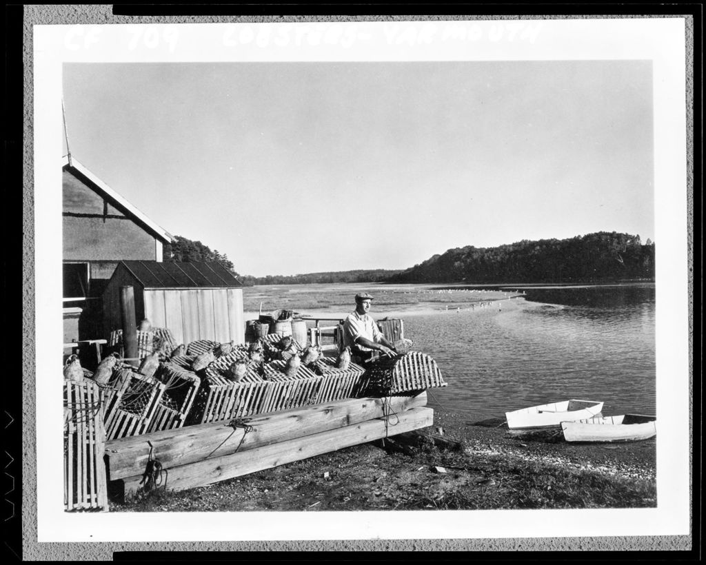 Miniature of Lobsterman Repairing Traps On A Wharf In Yarmouth