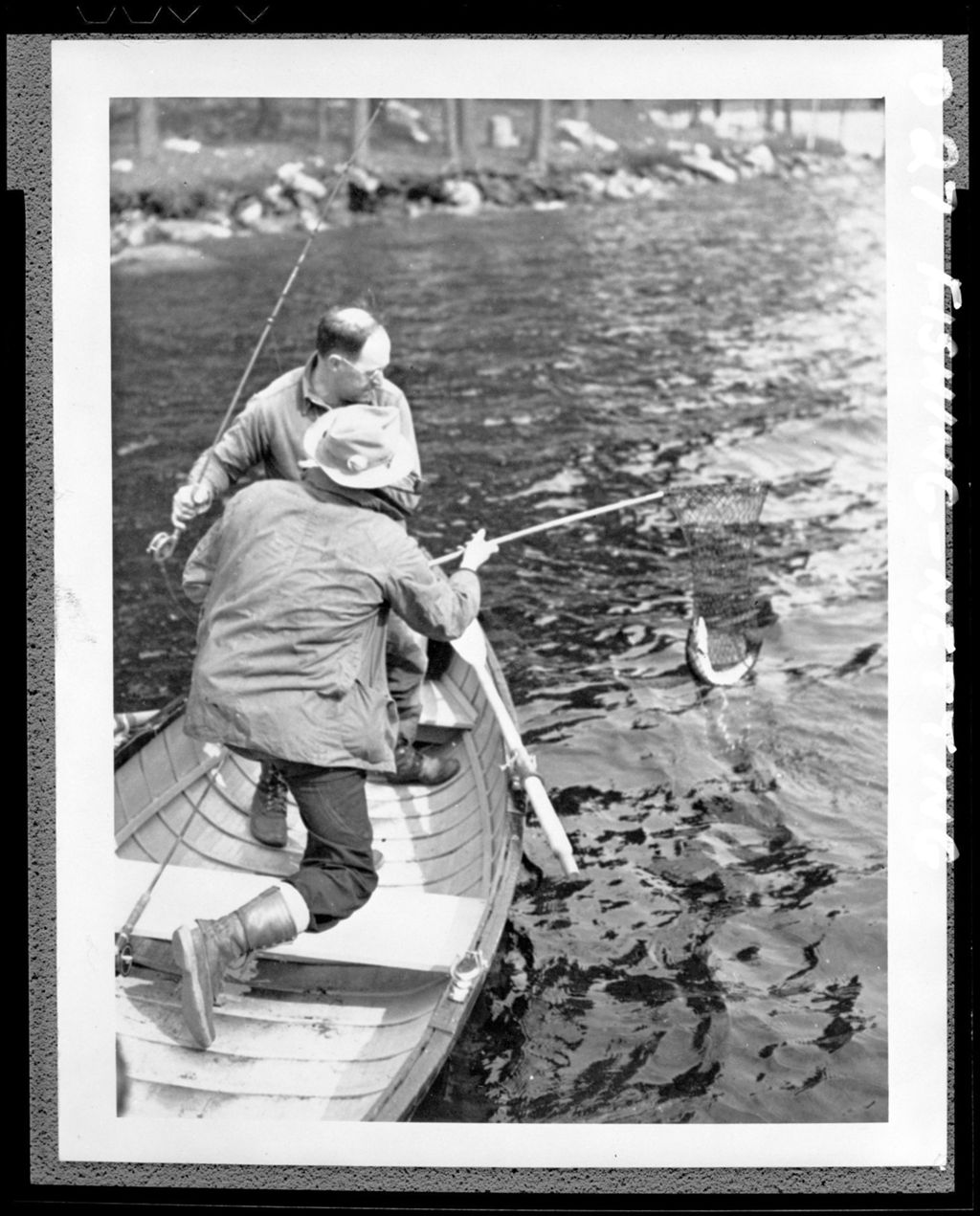 Miniature of Two Men In A Boat, One Netting Catch For The Other