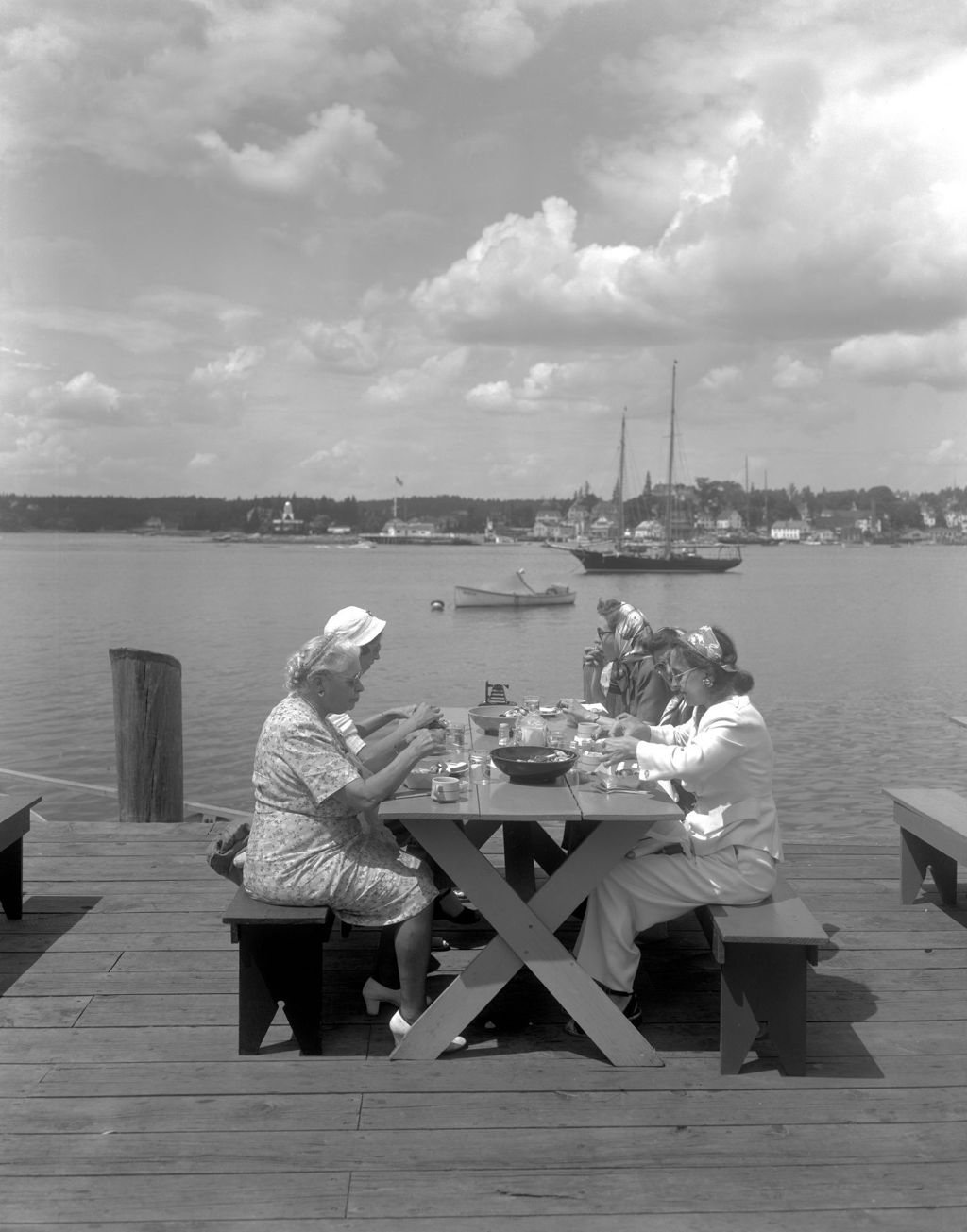 Miniature of Five Ladies Eating Lobster At A Picnic Table On A Wharf In Boothbay Harbor