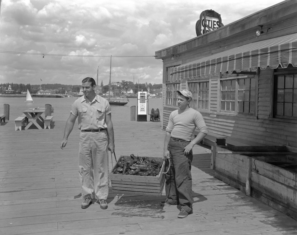 Miniature of Two Men Holding A Crate Of Lobsters In Boothbay Harbor