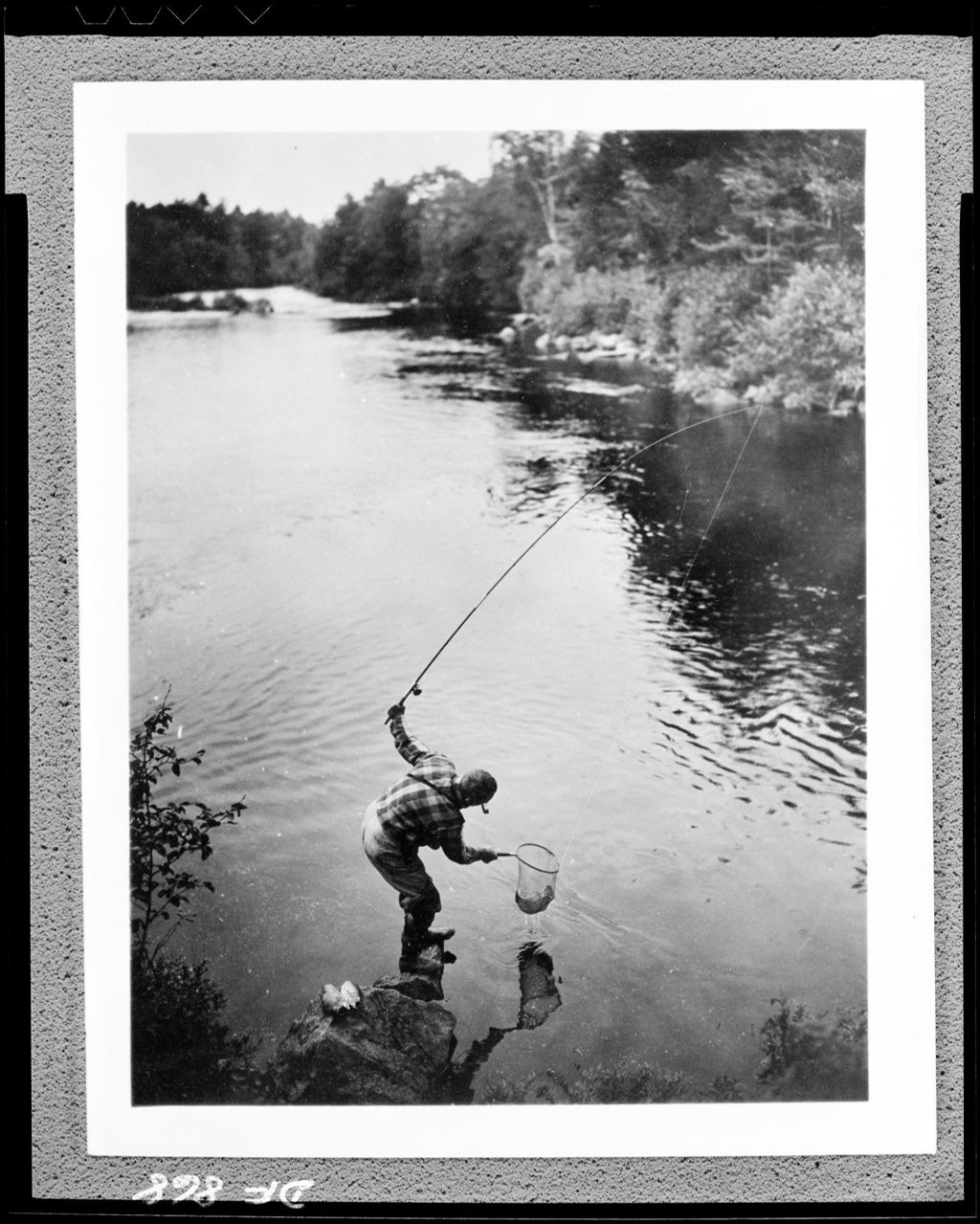 Miniature of Man Standing In Stream Netting Fish