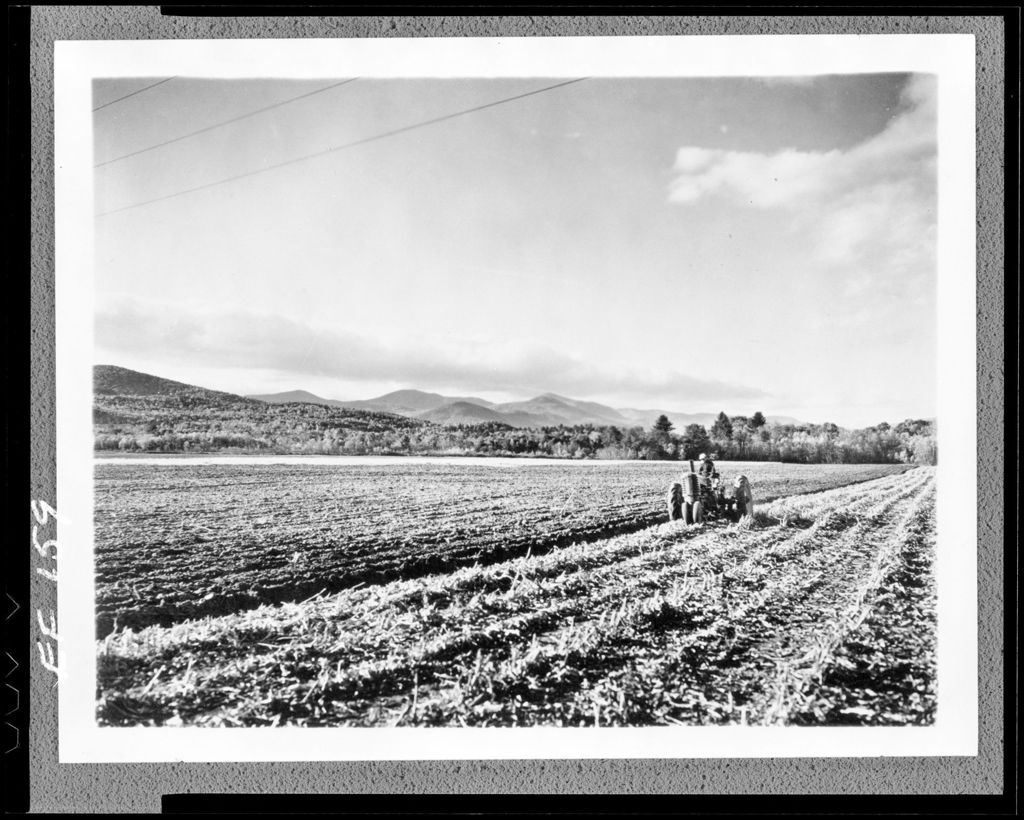 Miniature of Worker On Tractor Plowing Field In Fryeburg; Mountains In Background