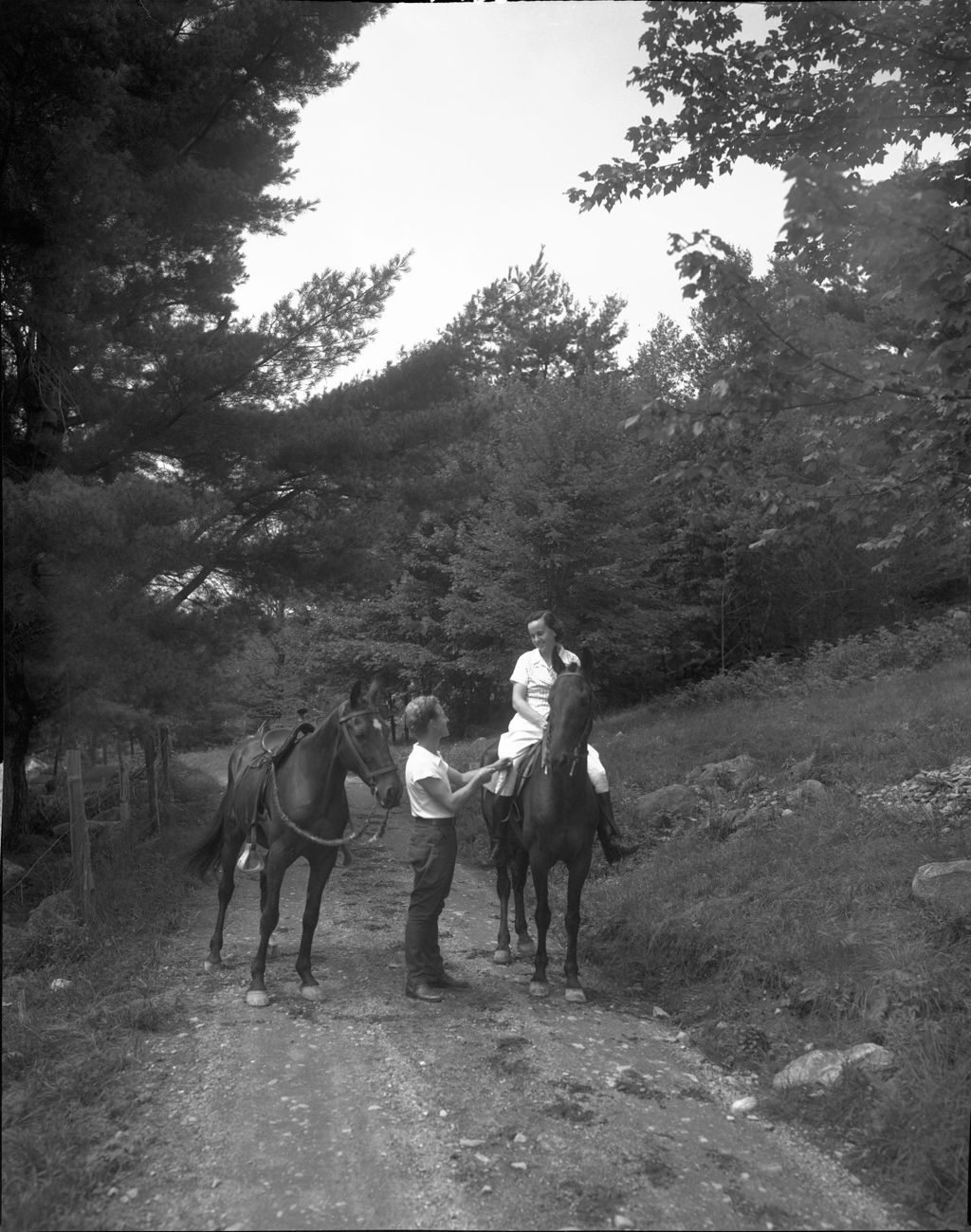 Miniature of Man And Woman Horseback Riding On A Woods Road At Camp Wavus In Jefferson