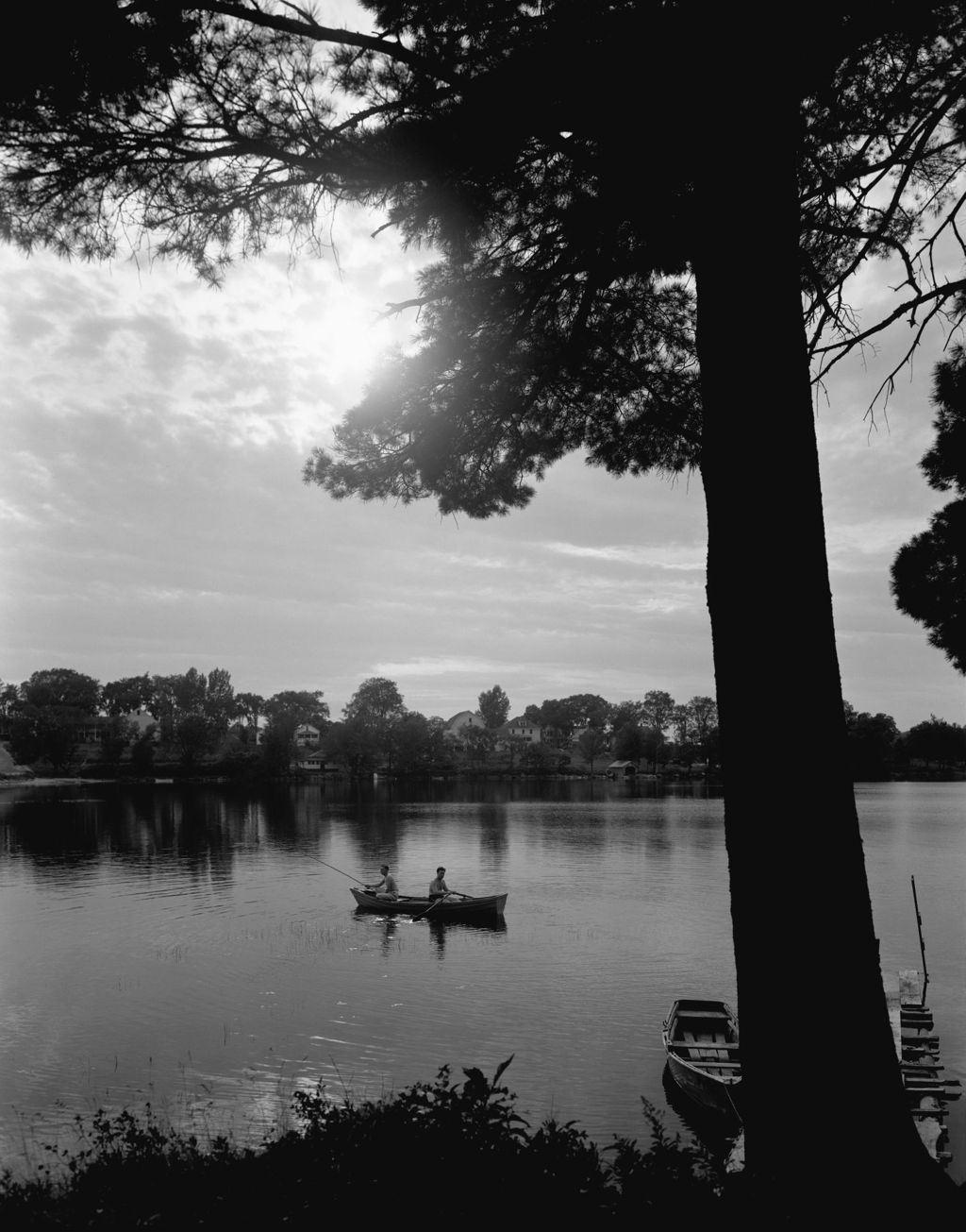 Miniature of Fisherman In A Boat On Pleasant Pond In Early Morning